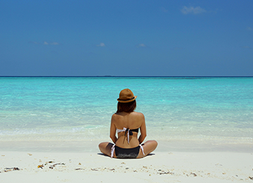 Illustration of a holiday maker representing holiday loans for travel financing.
