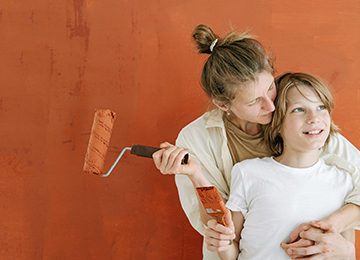 Illustration of a house under renovation with financial icons representing home improvement loans.